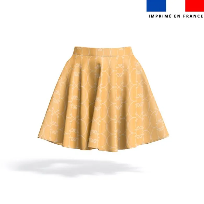 Arabesques beige clair - Fond abricot