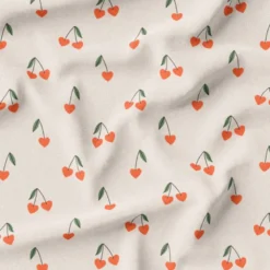 Cerise en forme de coeur orange - Fond beige