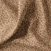 Coton enduit motif léopard marron et kaki