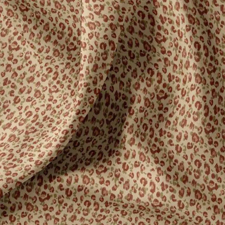 Coton enduit motif léopard marron et kaki