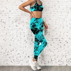 Lycra motif fluide noir et bleu turquoise