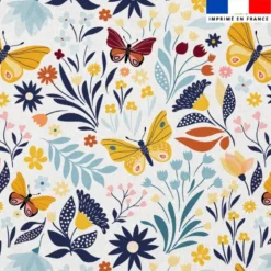 Mousseline blanche motif papillons jaunes