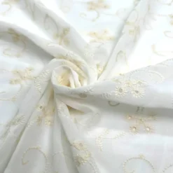 Mousseline ivoire brodée fleurs