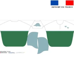 Patron imprimé sur tissu éponge pour poncho de bain motif dino vert