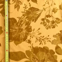 Popeline de viscose jaune motif feuilles ocre