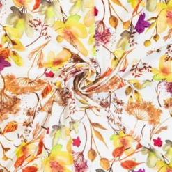 Satin écru imprimé aquarelle de fleurs nuances de jaune et marron