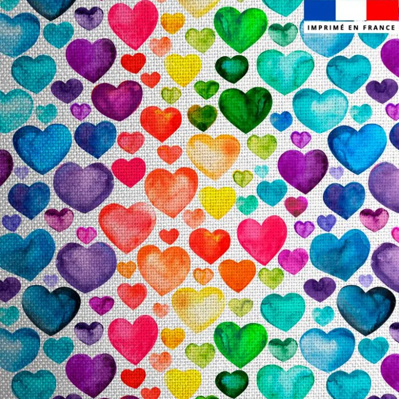 Tissu burlington blanc imprimé coeurs arc-en-ciel effet aquarelle