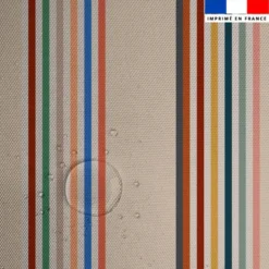 Tissu imperméable beige motif rayures colorées