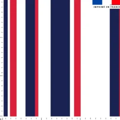 Tissu imperméable blanc motif bayadère bleue et rouge