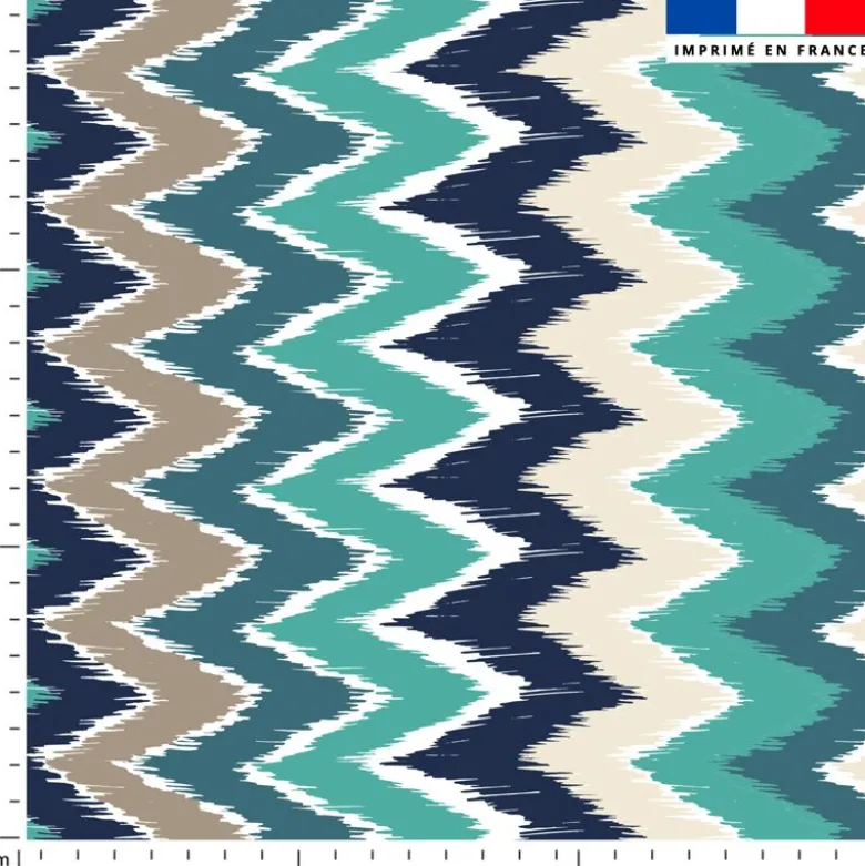 Tissu imperméable bleu motif chevron vert et grège