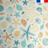 Tissu imperméable créme motif coquillage et étoile de mer