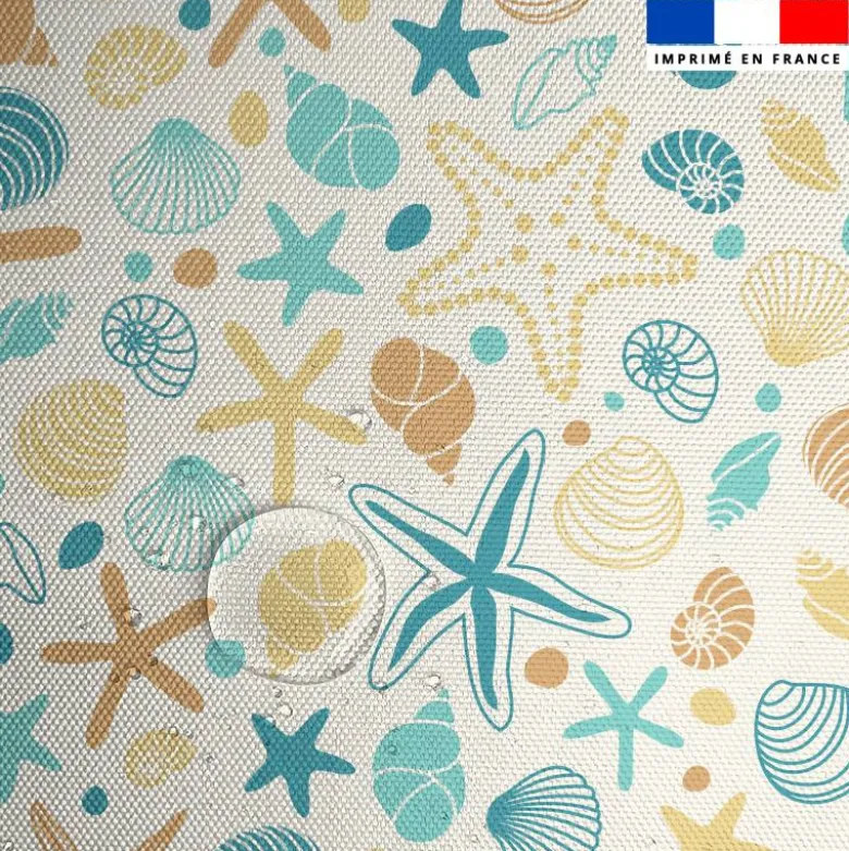 Tissu imperméable créme motif coquillage et étoile de mer