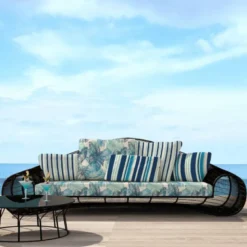 Tissu imperméable écru motif feuille de monstera bleu