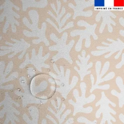 Tissu imperméable motif corail blanc fond beige