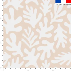 Tissu imperméable motif corail blanc fond beige