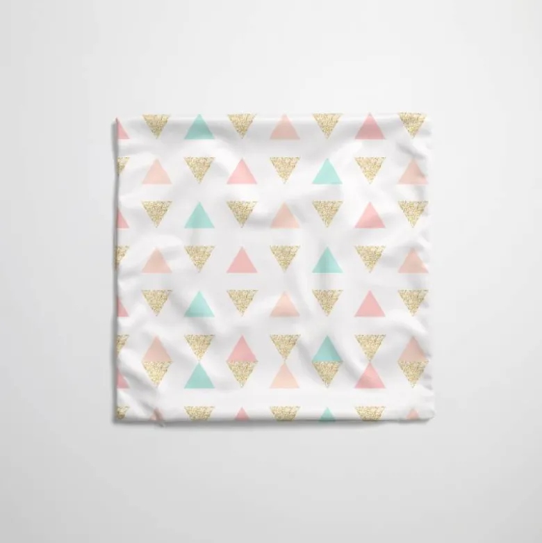 Tissu imperméable motif grands triangles pastel et paillettes