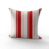 Tissu imperméable motif rayures verticales rouge et saumon