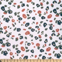Tissu imperméable type ciré beige motif léopard