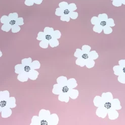 Tissu imperméable type ciré vieux rose motif fleur blanche
