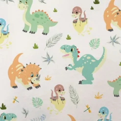 Tissu minky blanc motif bébé dino