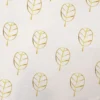 Tissu minky blanc motif feuille dorée