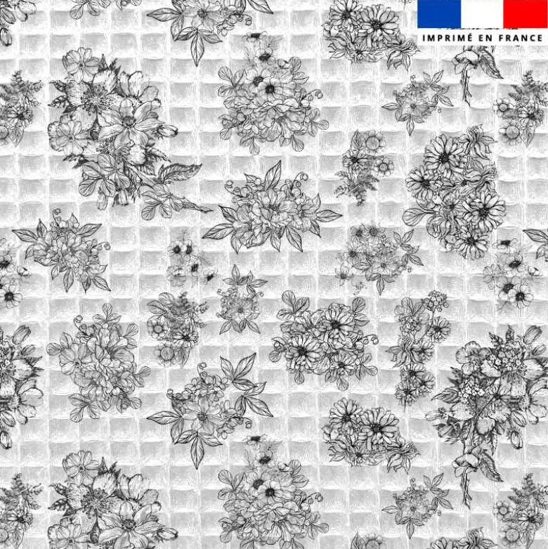 Tissu nid d'abeille motif bouquet de fleurs blanches et noires