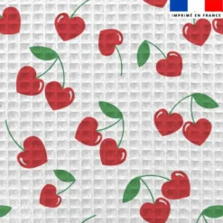Tissu nid d'abeille motif cerise coeur rouge