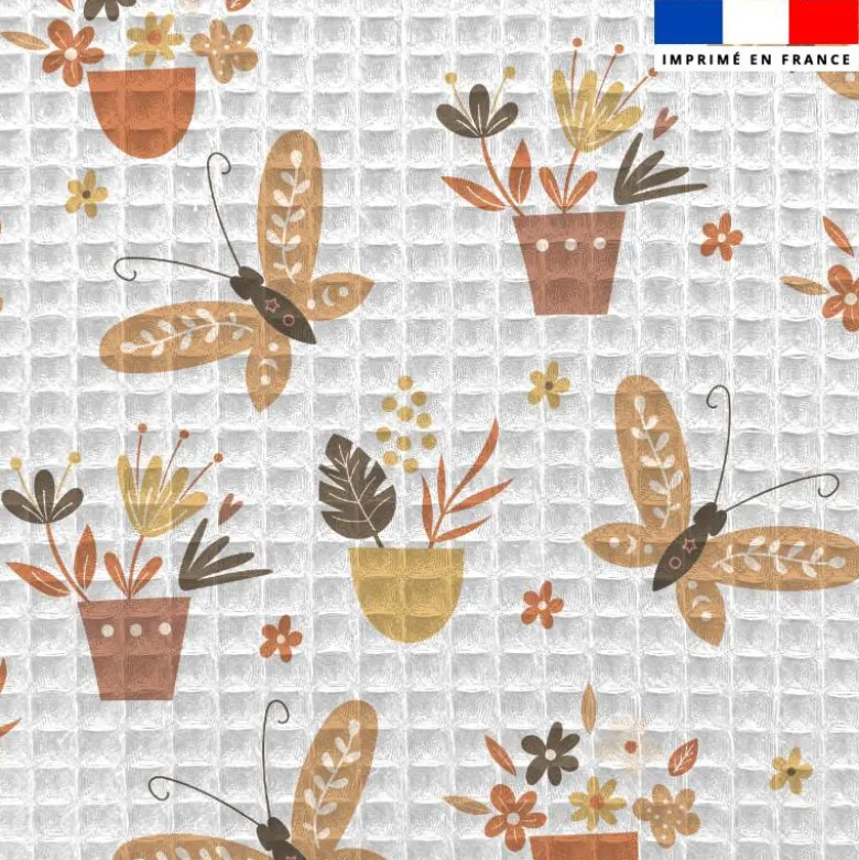 Tissu nid d'abeille motif papillon et botanique